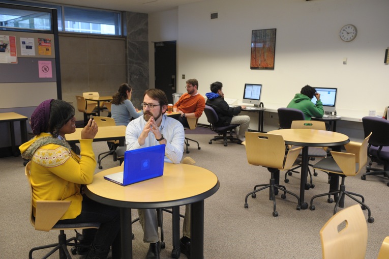 Working with a student in the Writing Center in 2010